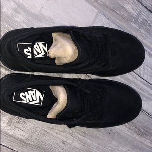All black vans.